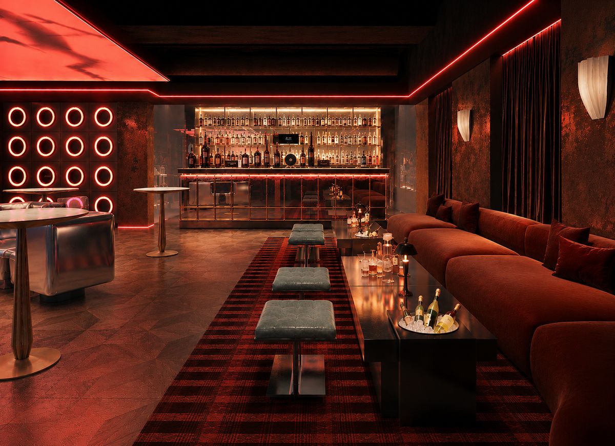 Little More Lounge at VANTA, a backlit bar and red velvet banquettes under red light