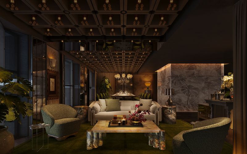 A private salon at VANTA with velvet armchairs, greenery and a coffered ceiling