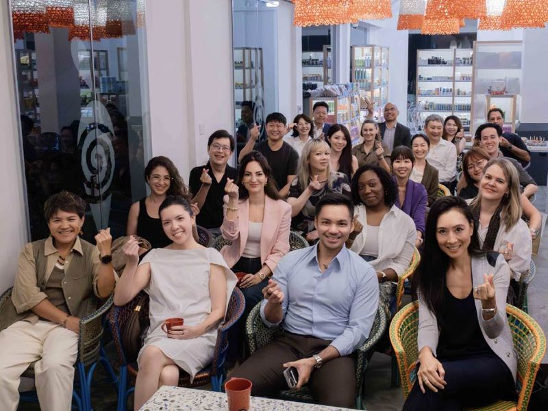 A large group of members smiling together at a VANTA gathering